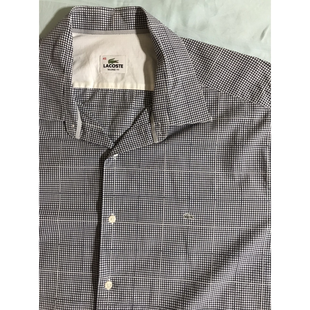 เสื้อ Lacoste TAILORED FIT XL แท้ ลายสก๊อตขาวดำเนื้อผ้านิ่มไม่ร้อน รอบเอว 46นิ้ว รออบอก 46นิ้ว แขน 2