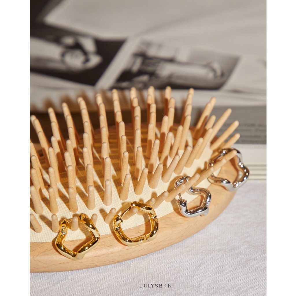 Julys - wave huggie earrings