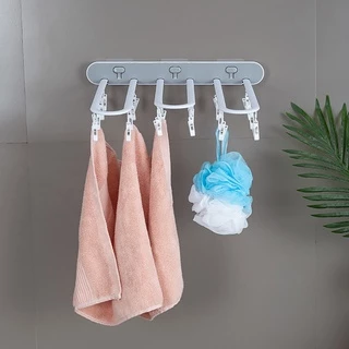 ลด10% โค้ด DDXDECW4 ที่หนีบผ้าติดผนัง พับได้ หนีบได้ 24 ชิ้น