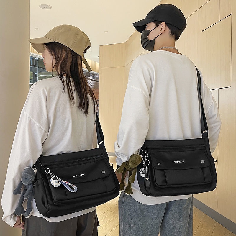 freitag♤▦กระเป๋าสะพายข้างผู้ชายแบรนด์อินเทรนด์แฟชั่นกระเป๋าสะพายกระเป๋า messenger ป่าญี่ปุ่นสบาย ๆ 2021 ใหม่กระเป๋าใบเล็