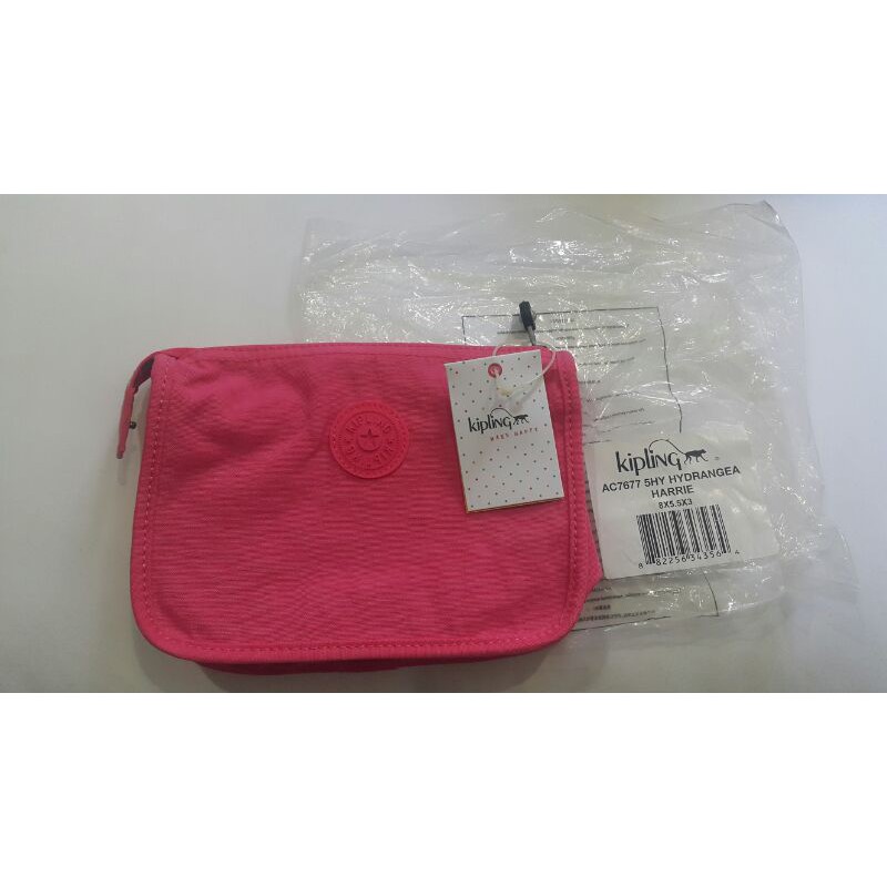 กระเป๋า Kipling สีชมพูนีออน ใส่ของจุกจิก ของแท้ ของใหม่ ป้ายห้อย จาก 34 USD.