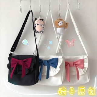 Hot sale # 🙏lolita retro sweet bow soft girl canvas bag Korean INS girl heart messenger bag jk bag . กระเป๋า