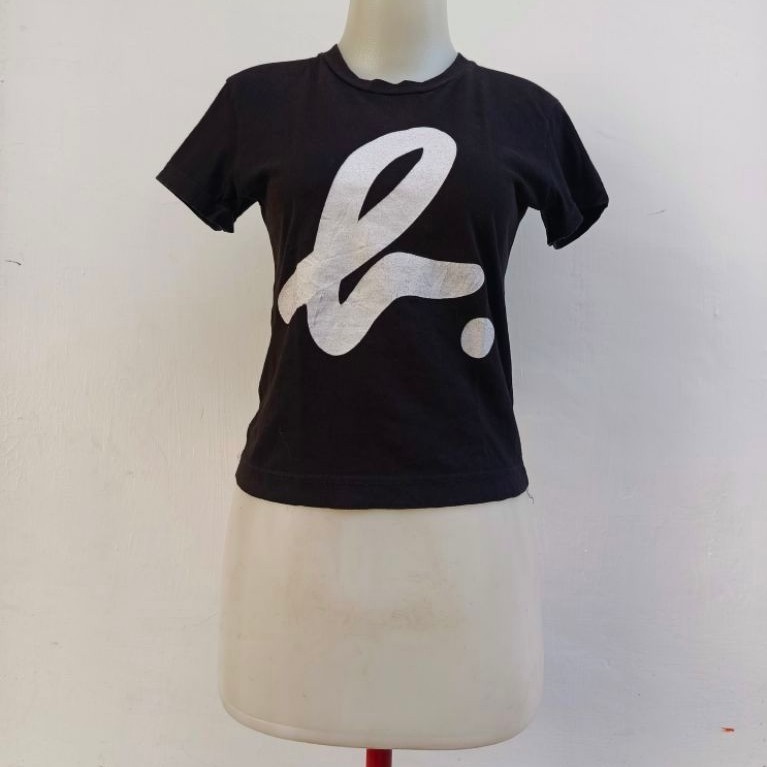 เสื้อยืดโลโก้ Agnes b