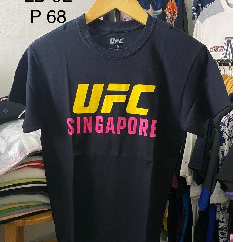 (68x46 แบบไม่ดึง) เสื้อยืดชกมวย UFC singapore official