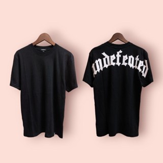 เสื้อยืด พิมพ์ลาย Madness undefeated