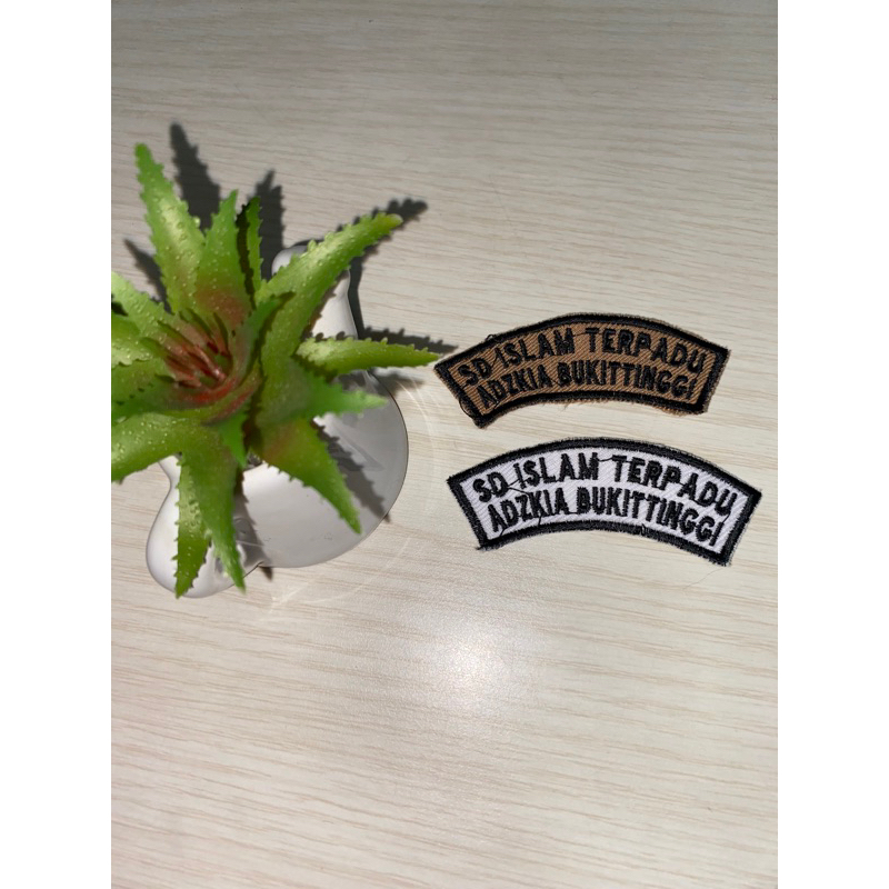 EMBROIDERED LOCATION