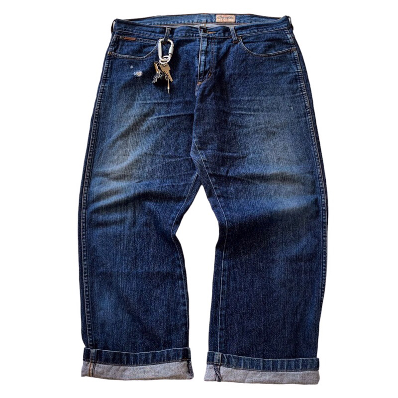 กางเกงยีนส์สีซีด Weangler / 95