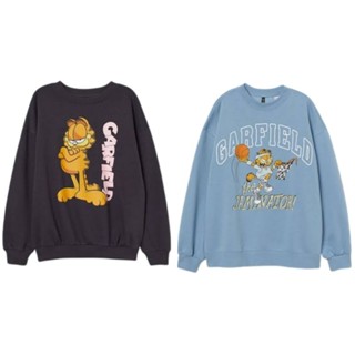 ป้ายแท็ก Crewneck HnM Garfield The Jamintor สีฟ้า สีดํา
