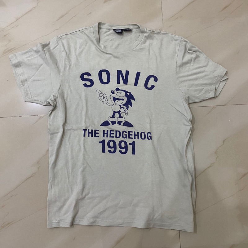 เสื้อยืด ผ้าฝ้าย ลาย Sonic the Hedgehog 1991 สีงาช้าง สีขาว สไตล์วินเทจ