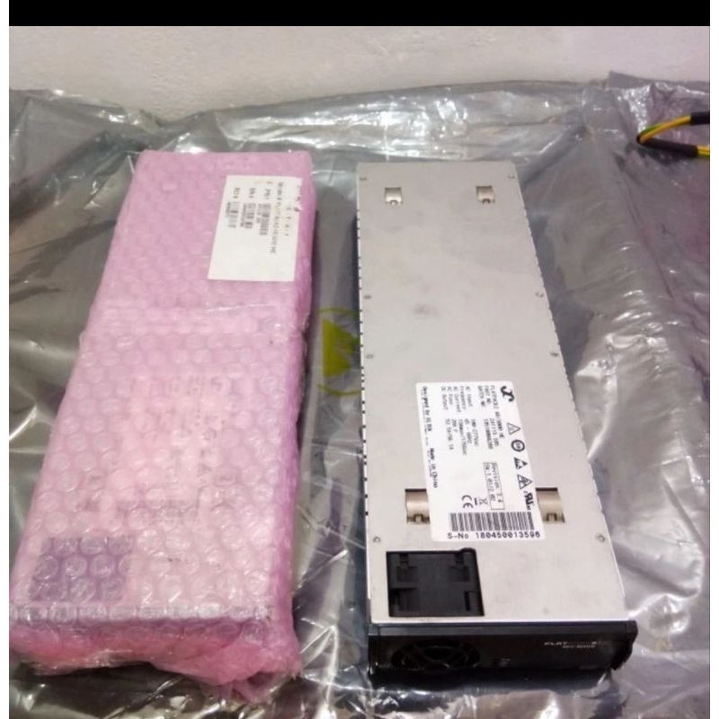 Eltek Flatpack2 HE 3000W 48Vdc แหล่งจ่ายไฟ AC to DC AC Input: 100V - 277VFrequency: 45Hz - 66HzAC Current: 19Amax /176AC ฟิวส์: 20A FDC Output: 51V3.5Vac