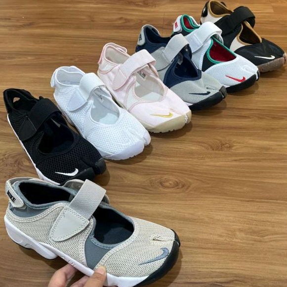 Nike AIR RIFT SLION ON PREMIUM รองเท้ากาว