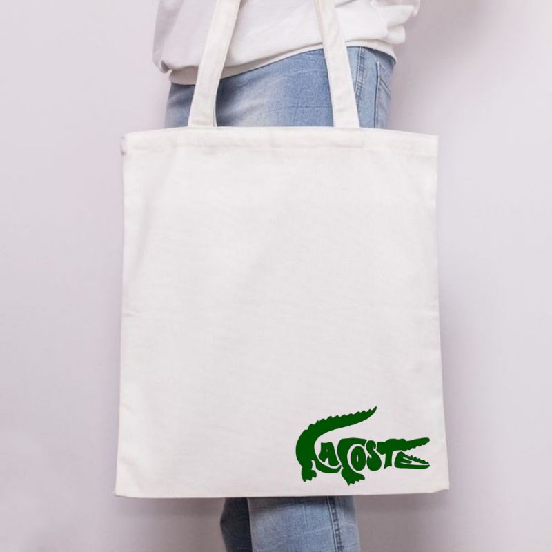 Putih Lacoste Distro Premium White Canvas Totebag / กระเป๋าโท้ตสีขาวแบรนด์ Lacoste / กระเป๋าช้อปปิ้งร่วมสมัย