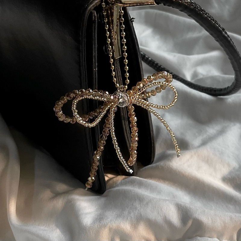 โซอี้ ริบบิ้นเสน่ห์ | กระเป๋าริบบิ้น Charm รองเท้าริบบิ้นรองเท้า Charm รองเท้าริบบิ้น Charm Coquette