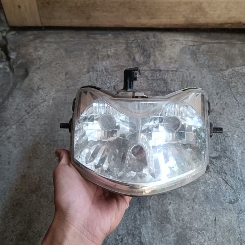 ถอดสะท้อนแสงไฟหน้า kawasaki zx 130 ดั้งเดิม