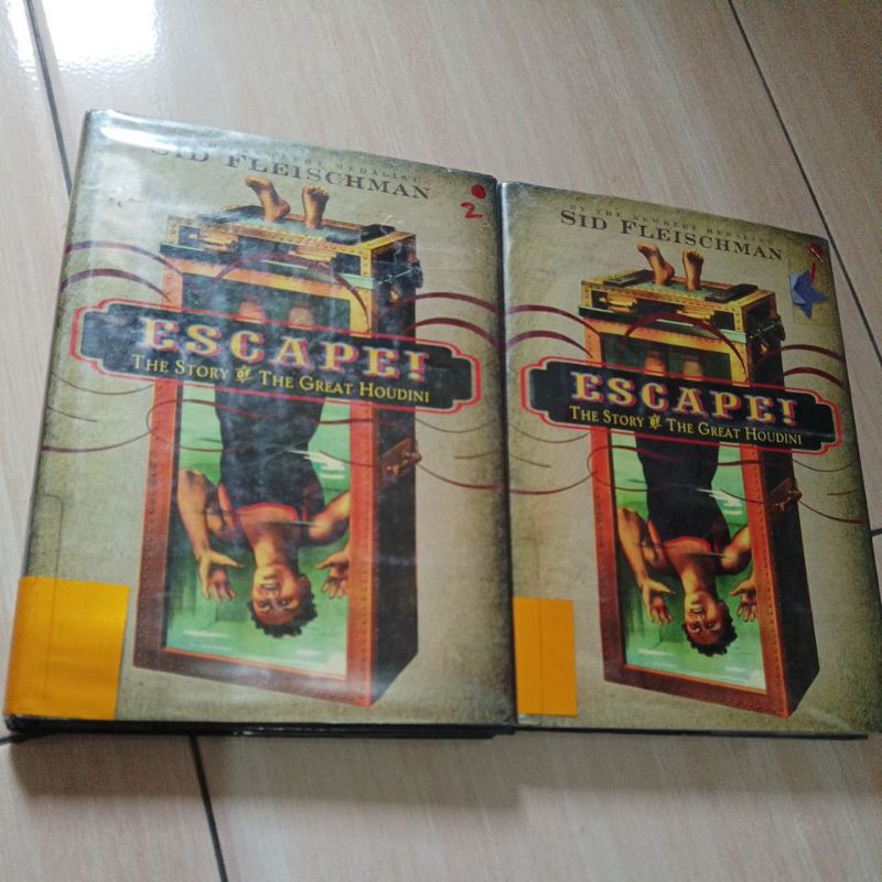 หนังสือภาษาอังกฤษเรื่องราวของ Houdini ที่ยิ่งใหญ่ที่ใช้ต้นฉบับ