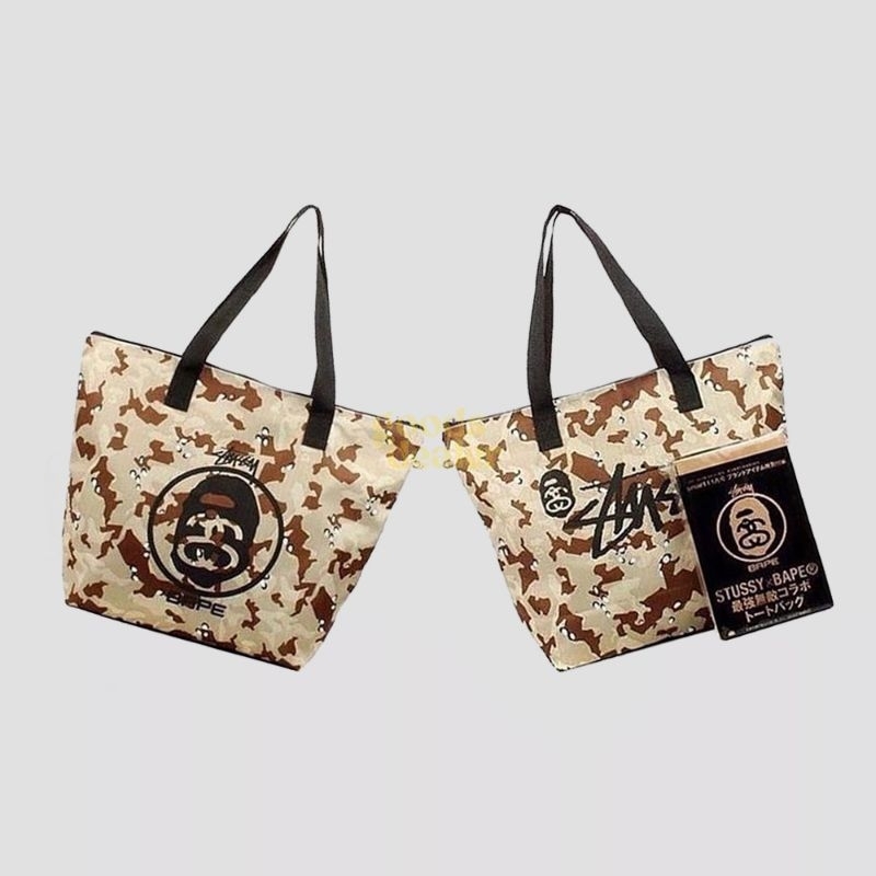 กระเป๋าโท้ตลายพราง Stussy X Bape