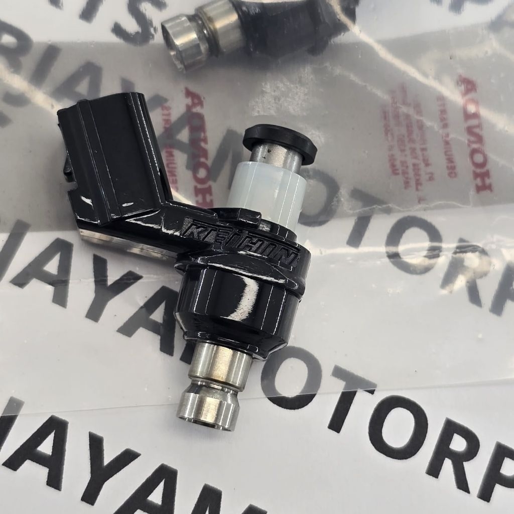 16450 -KZR-601 Vario 125 FI หัวฉีด