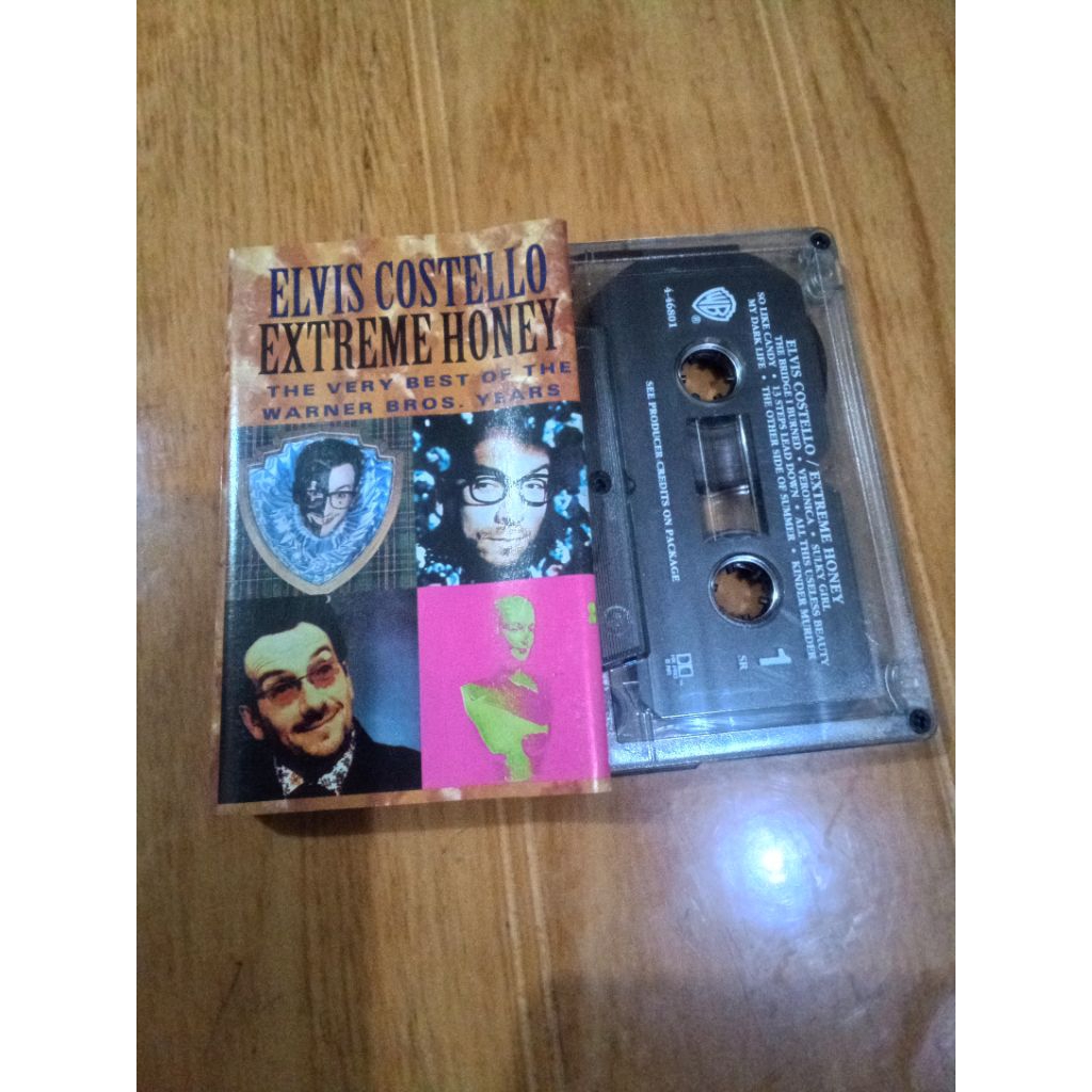 เทปคาสเซ็ท Elvis costello - น้ําผึ้งสุดขีด ที่สุดของปี warner bros