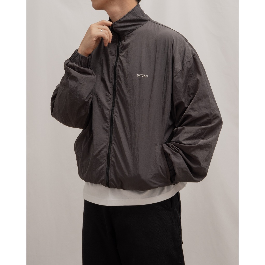UNTCKD - Funnel Nylon Track Jacket สีเทา (Track Jacket ทําจากไนลอน)