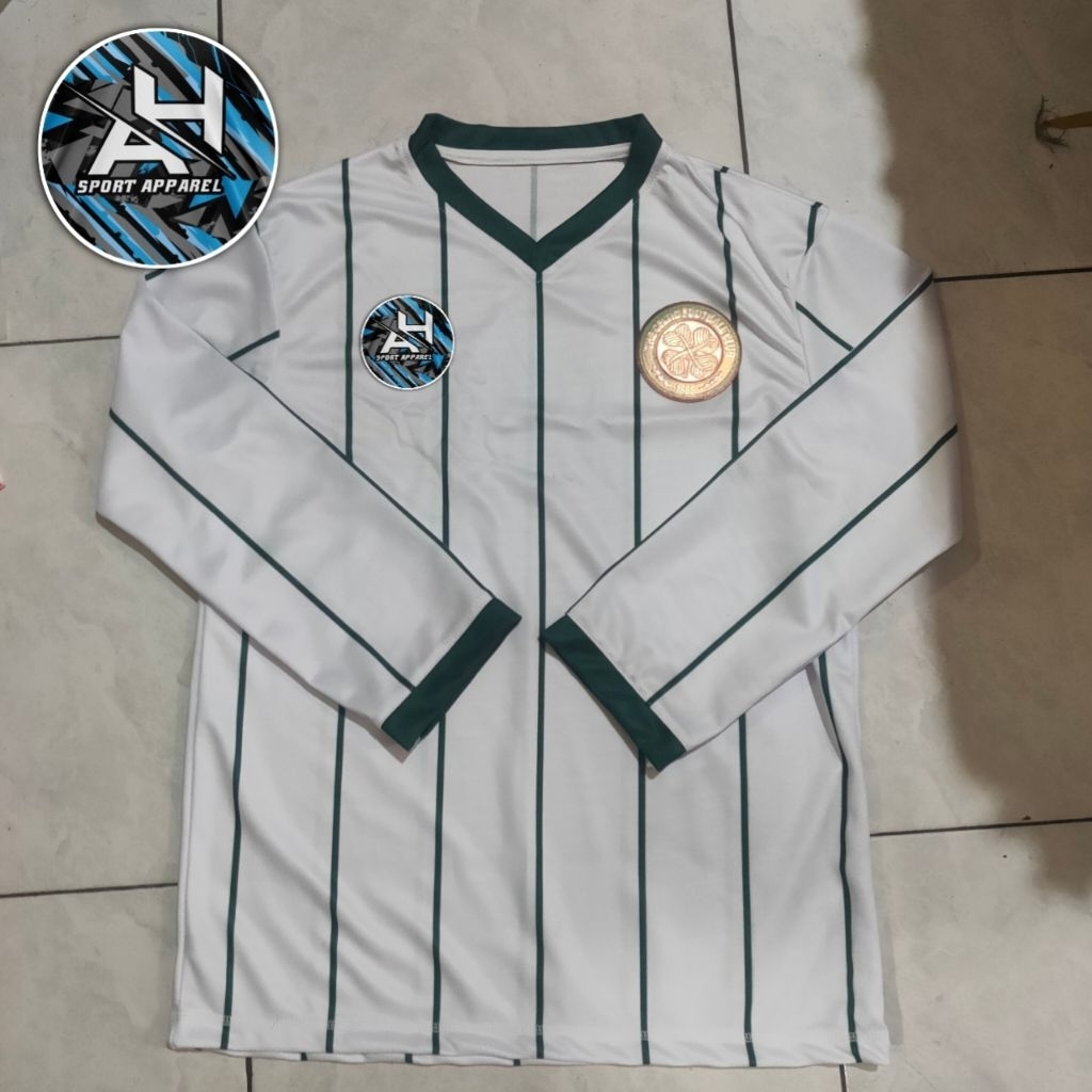 CELTIC SCOTLAND เสื้อแจ็คเก็ตย้อนยุคสีขาว 84-86 CELTIC 3D LOGO STRIP HOLOGRAM