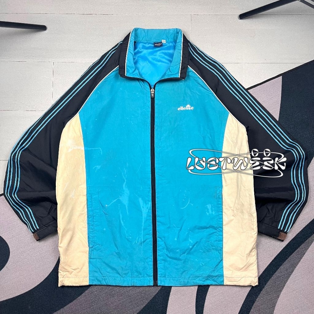 เสื้อแจ็คเก็ตร่มชูชีพ Ellesse