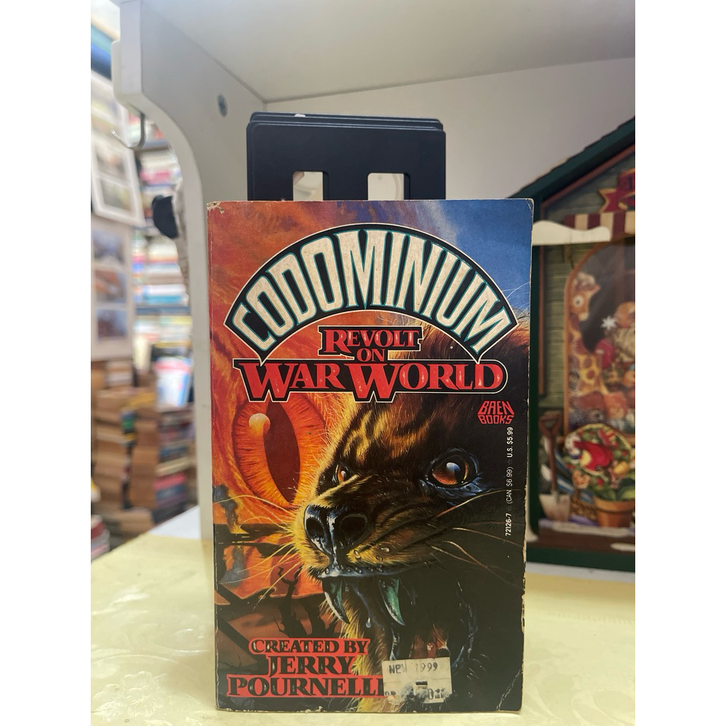 NOVEL CODMIIUM REVOLT ON WAR WORLD โดย JERRY POURNELLE