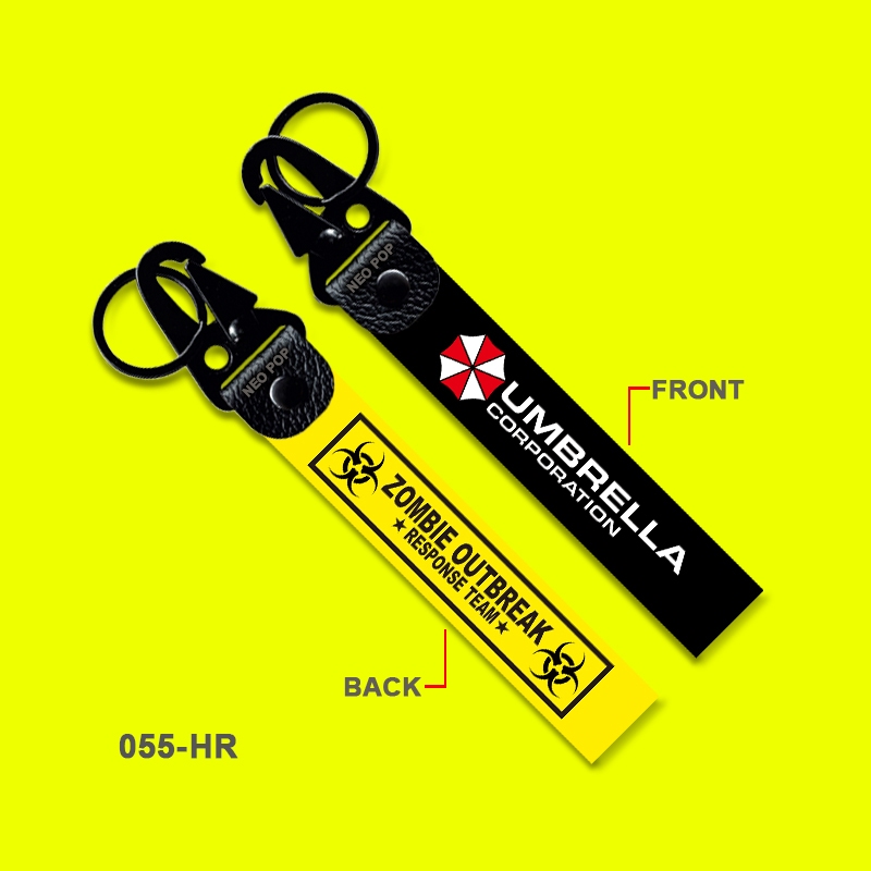 GANTUNGAN PREMIUM KEYCHAIN โลโก้ UMBRELLA CORPORATION KEY CHAIN TAG STRAP HOLDER รถจักรยานยนต์รีโมท MARCHENDISE PS RESIDENT EVIL 2 3 4 5 6 7 BIOHAZARD ZOMBIE ปลดรอบเกมเกมเกมเกมพีซี