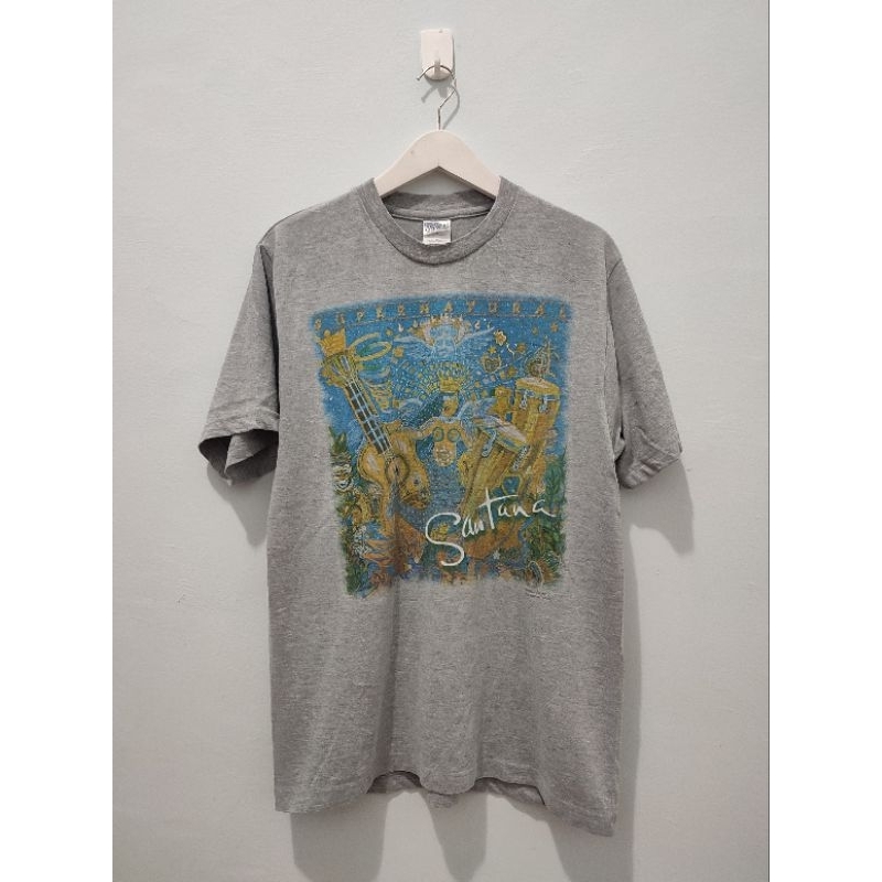 เสื้อยืดวงวินเทจ Santana ©อัลบั้มอภินิหาร 1999 ล