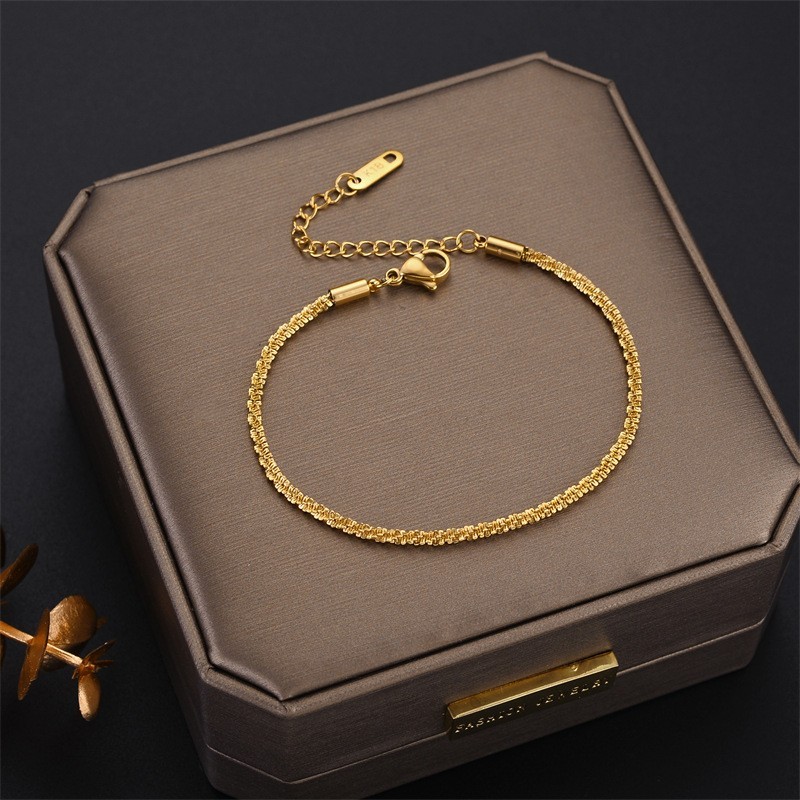 REEVA สร้อยข้อมือไทเทเนียมบิดผู้หญิงเกาหลี Simple Casual G0075