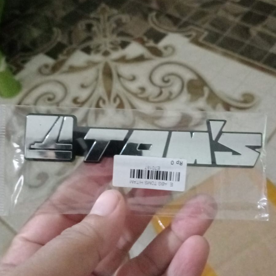 สัญลักษณ์สติกเกอร์ลายนูนของ Toms Toms Toms Toms