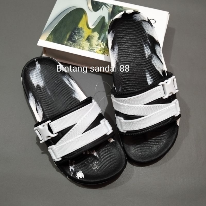 NX6-1B รองเท้าแตะล็อปยางไวรัสสําหรับเด็กผู้ชายแฟชั่นรองเท้าแตะสไลด์วัสดุ Eva สําหรับผู้ชายและผู้หญิง