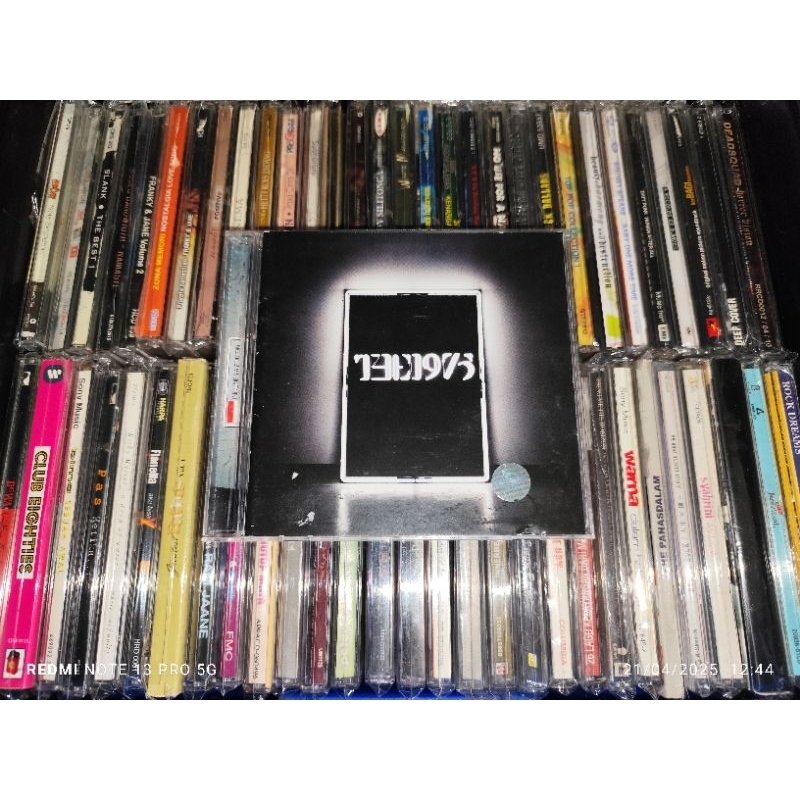 CD The 1975 - The 1975 Hits Singles The City, Chocolate, Girls, Settle Down