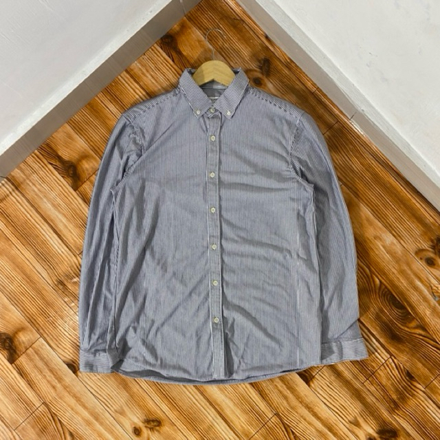 เสื้อลายทาง KEMEJA TOPTEN