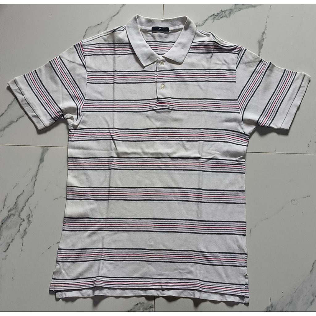 เสื้อยืดคอปกลายทาง GU