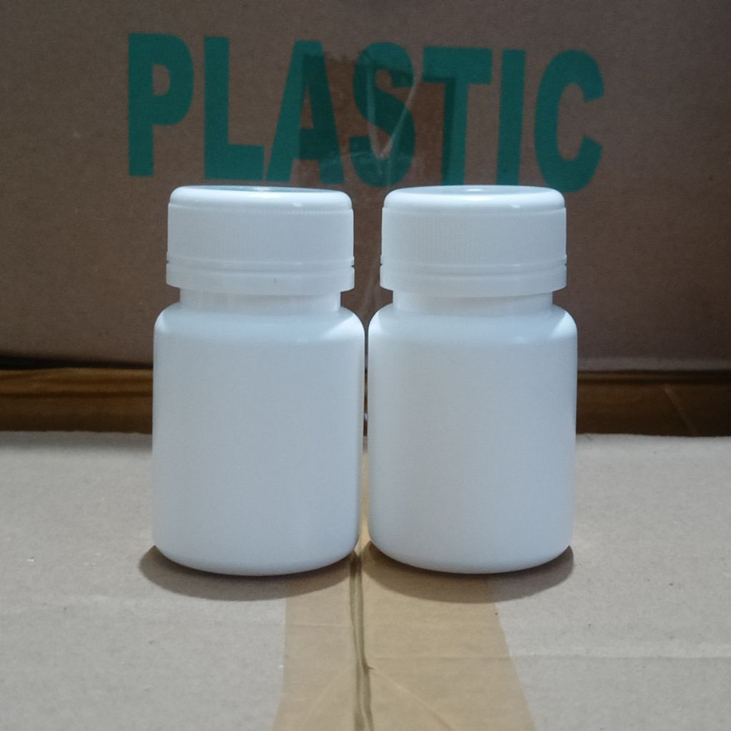 ขวดเอสเตอร์ขนาด 60 มล. พร้อมซีลสีขาว | CAPSULE PACKAGING BOTTLE