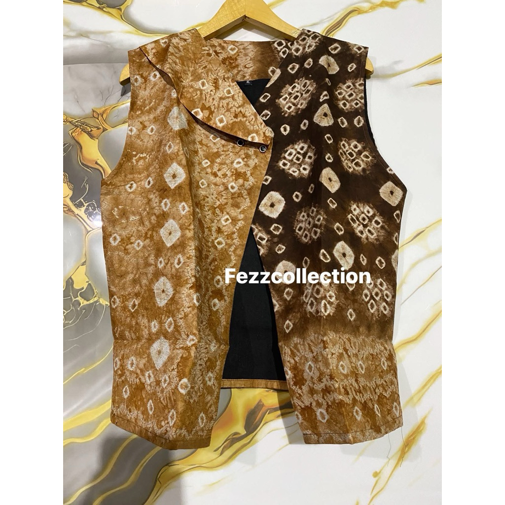 เสื้อกั๊ก jumputan gambo muba