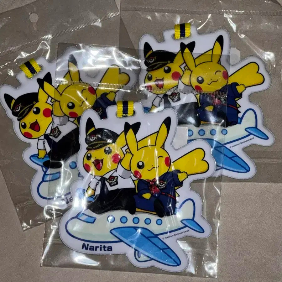 ศูนย์โปเกมอน Japan NARITA Airport Limited Pilot CA ป้ายห้อยกระเป๋าเดินทาง