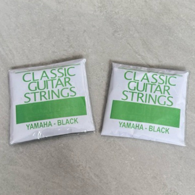 1 ชุดนําเข้า YAMAHA NYLON BLACK GUITAR STRINGS / YAMAHA / CLASSIC / GUITAR STRINGS / ONE SET OF STRI