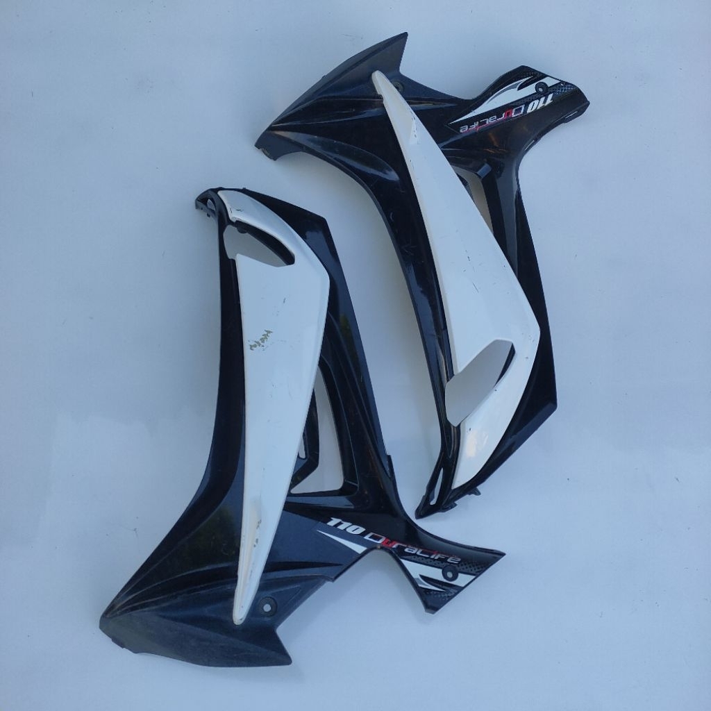 ด้านหน้าฝาครอบปีกขวาซ้ายทีวี NEO XR 110 WINGS TVS NOE X3i Original Copotan