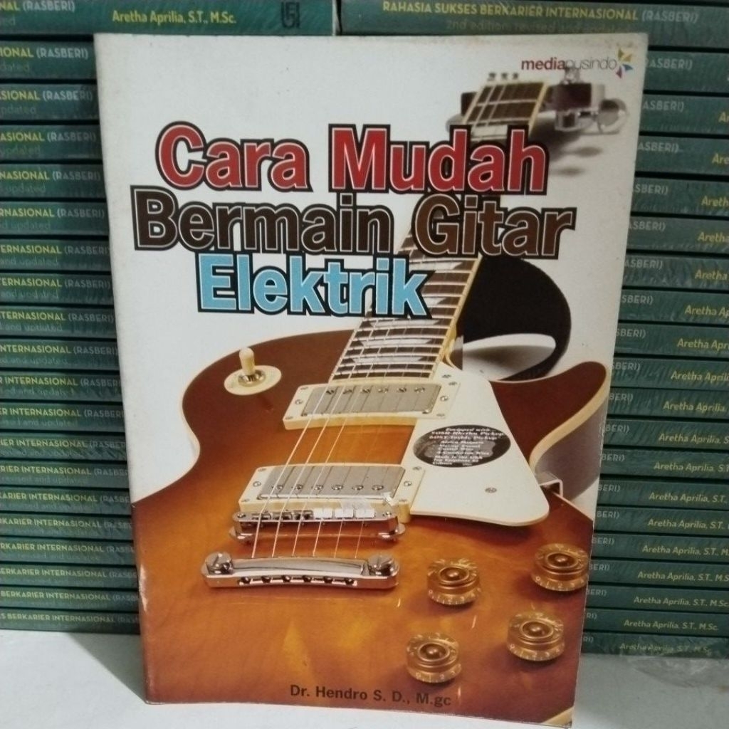 หนังสือบน HOW TO LEARN TO PLAY ELECTRIC GUITAR