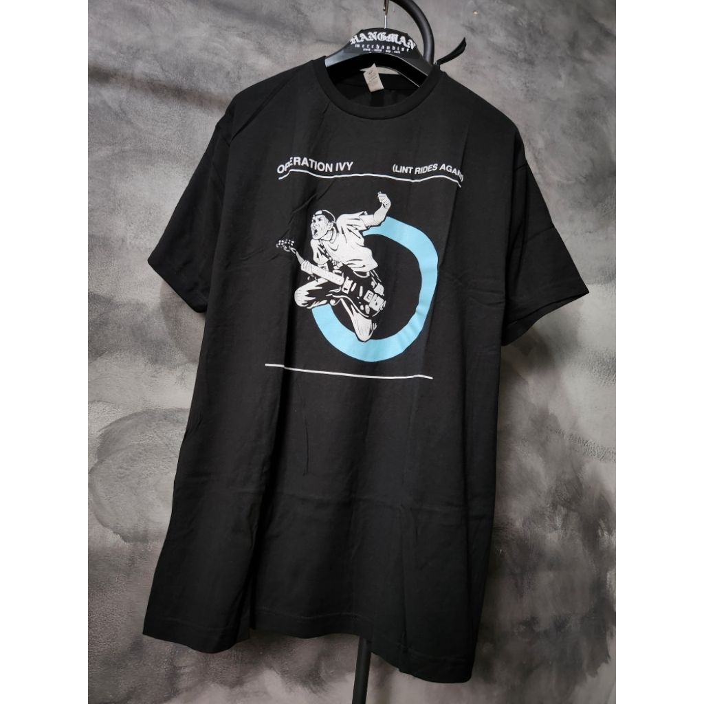 Operation Ivy Official - Lint Rides Again Tee (สีดํา) เสื้อยืด Kaos Band