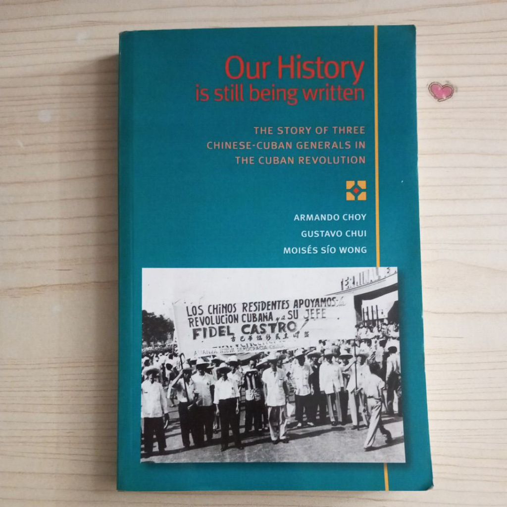 OUR HISTORY BOOK หันหน้าไปทาง โดย ARMANDO CHOY และ GUSTAVO CHUI และ MOISES SIO WONG