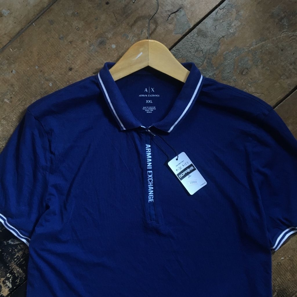เสื้อโปโล ARMNI-X-CHNGE ไซส์ Fit Xl มือสองแท้ (รูมิน)