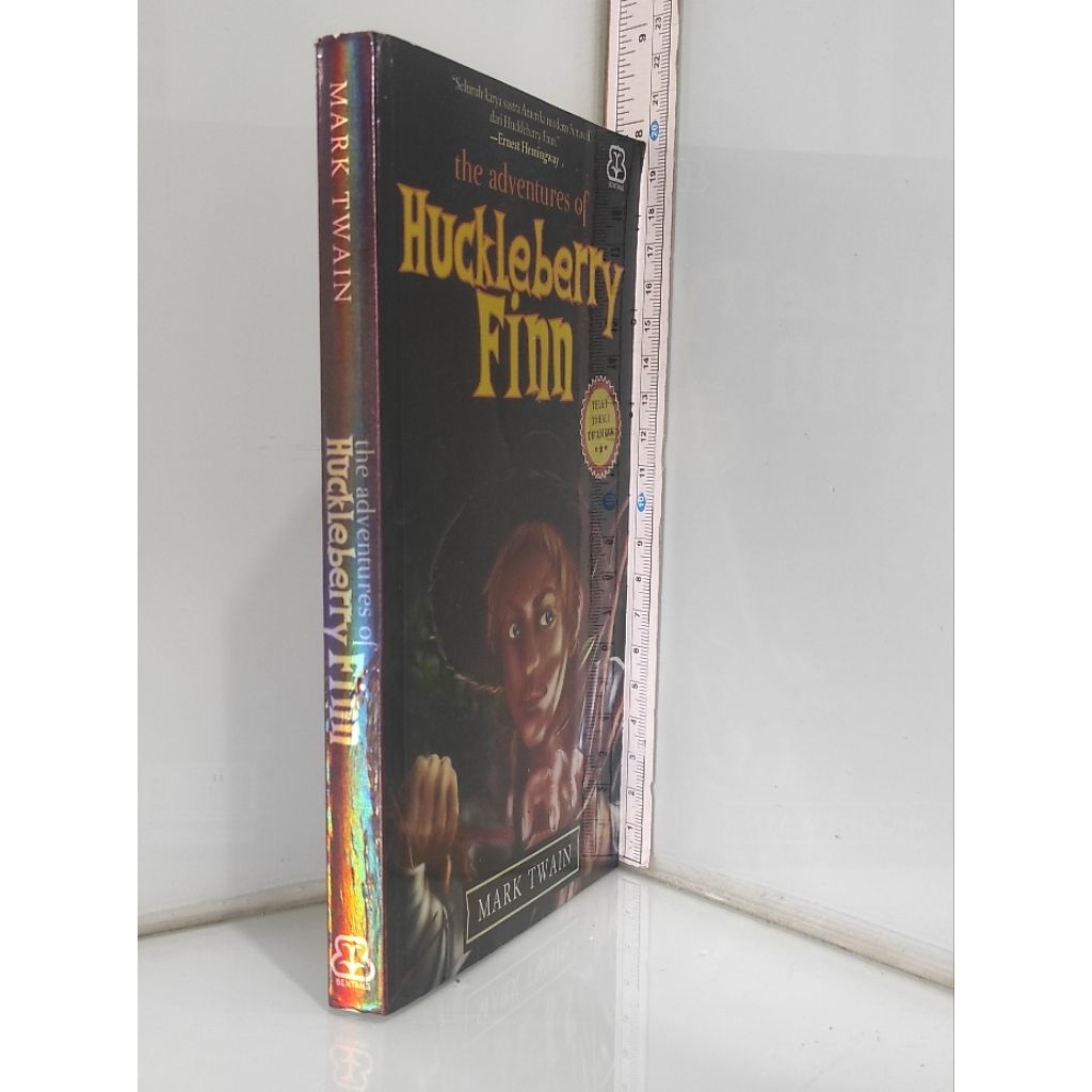 ผจญภัยของ Huckleberry Finn MARK TWAIN