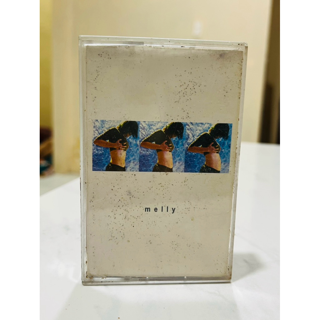 MELLY Cassette Tape (ต้นฉบับ) - อัลบั้ม Solo Perdana Melly Goeslaw