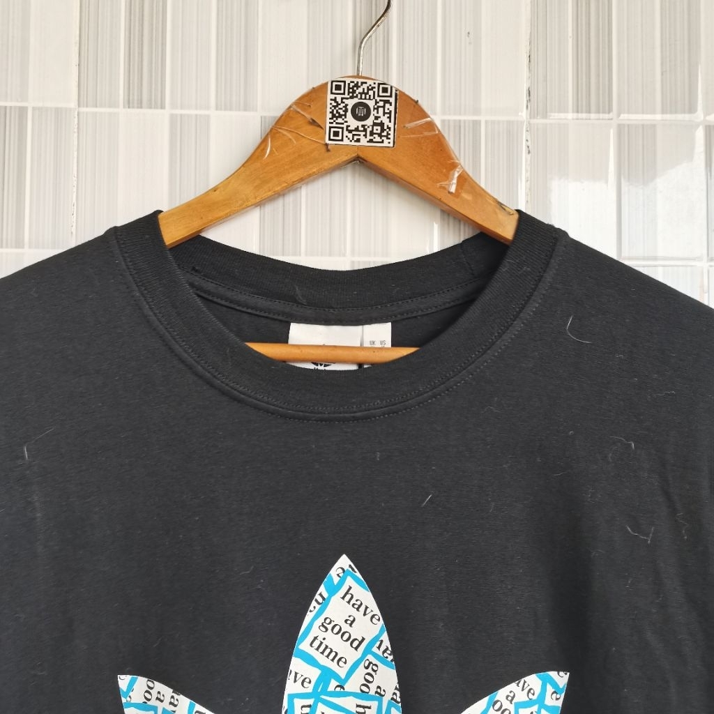 1154. เสื้อยืดสีดํา ไซส์ L PRELOVED