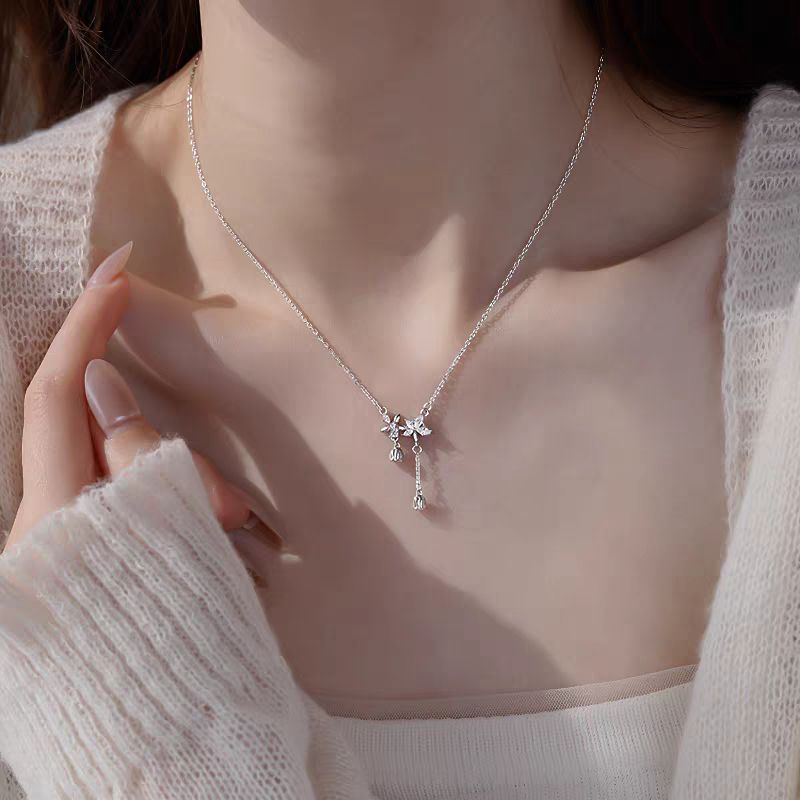 พระเจ้าช่วย! Jewelry.Shop - สร้อยคอไทเทเนียมผู้หญิงเกาหลีแบบปรับได้สร้อยคอพู่ Lily of the Valley KS0