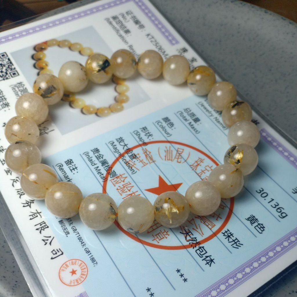 สร้อยข้อมือหินธรรมชาติไทเทเนียม Rutile สีทองธรรมชาติ R±19.5ซม. ±10.011มม. ใบรับรอง