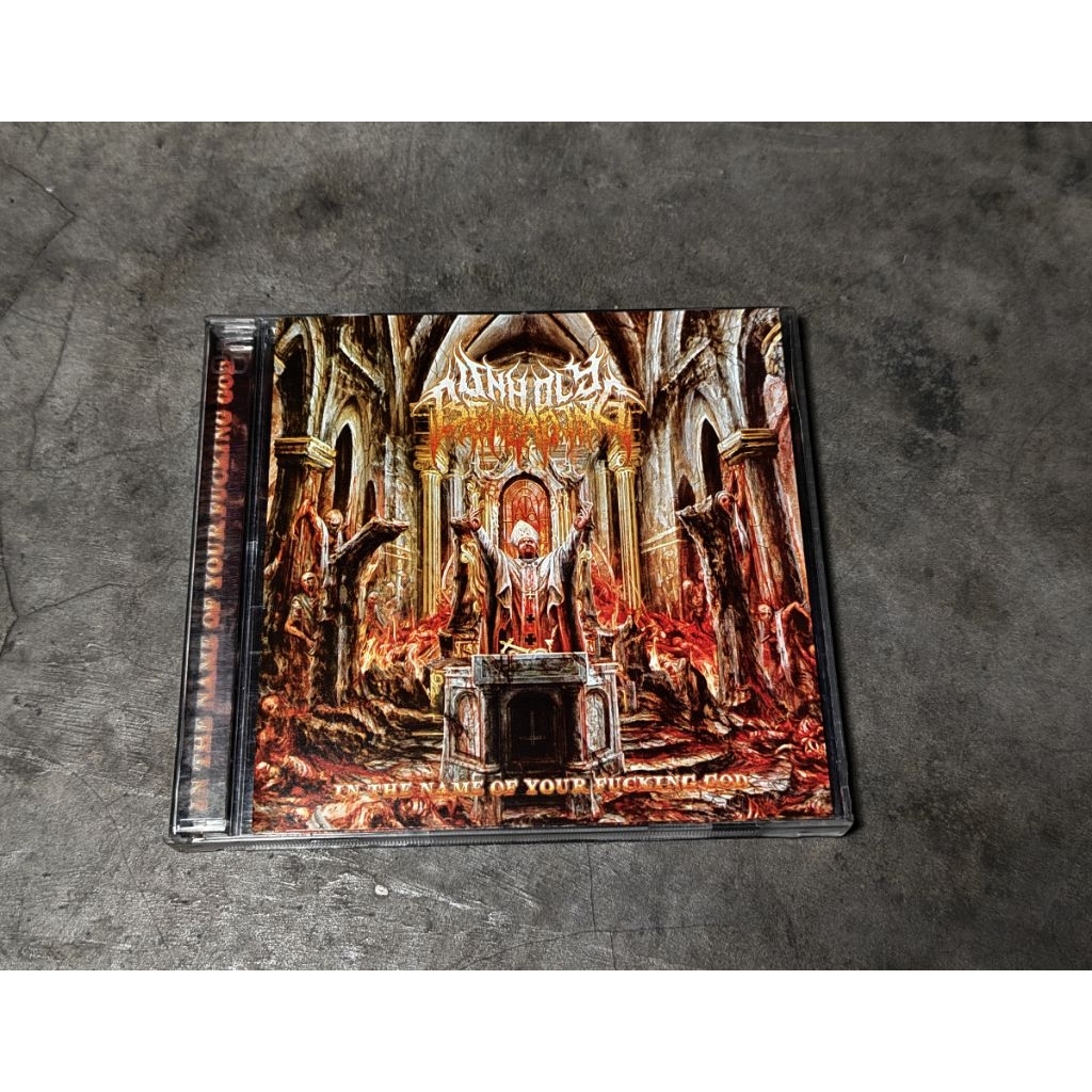 ซีดี UNHOLY BEHEADING ดั้งเดิม