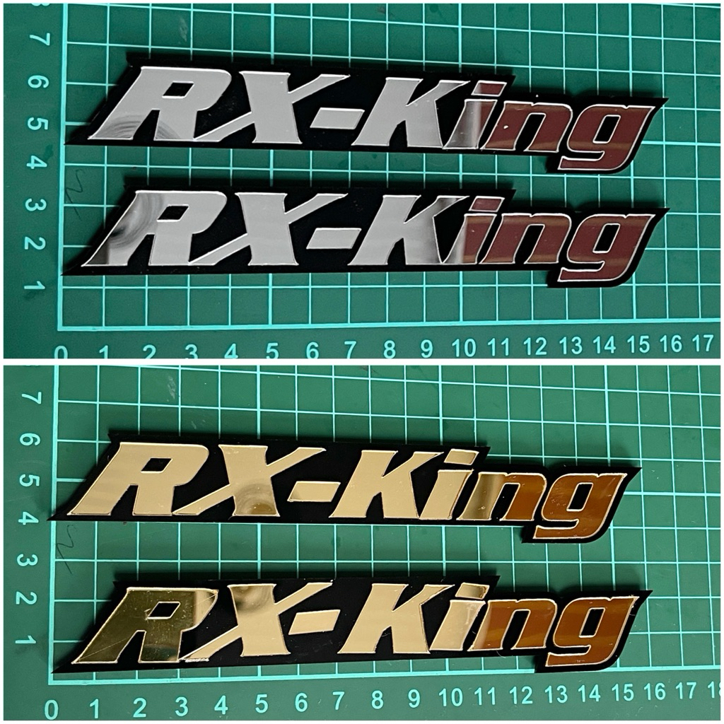 ราคาสําหรับ A PAIR OF 3D ACRYLIC RX KING EMBLEMS